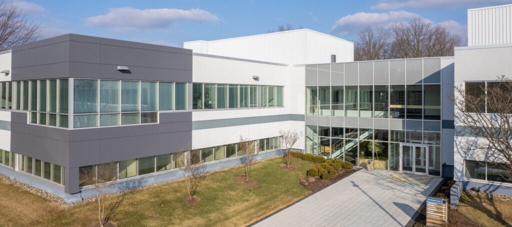 The outside of the Fleisher Forensics office building on a sunny day.