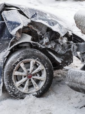 Crashed cars in accident on winter road